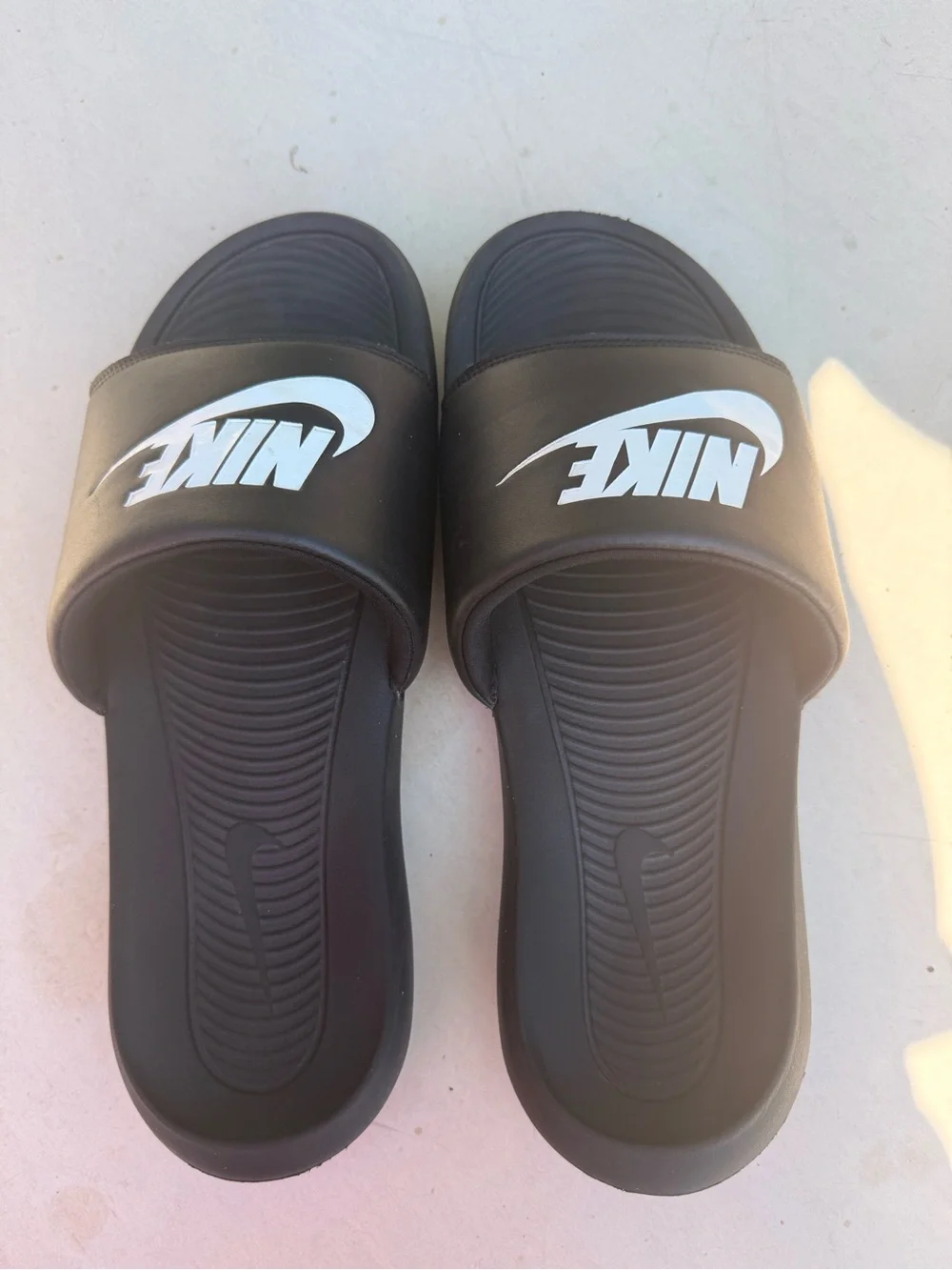 Men’s Nike Black Slides with White Logo